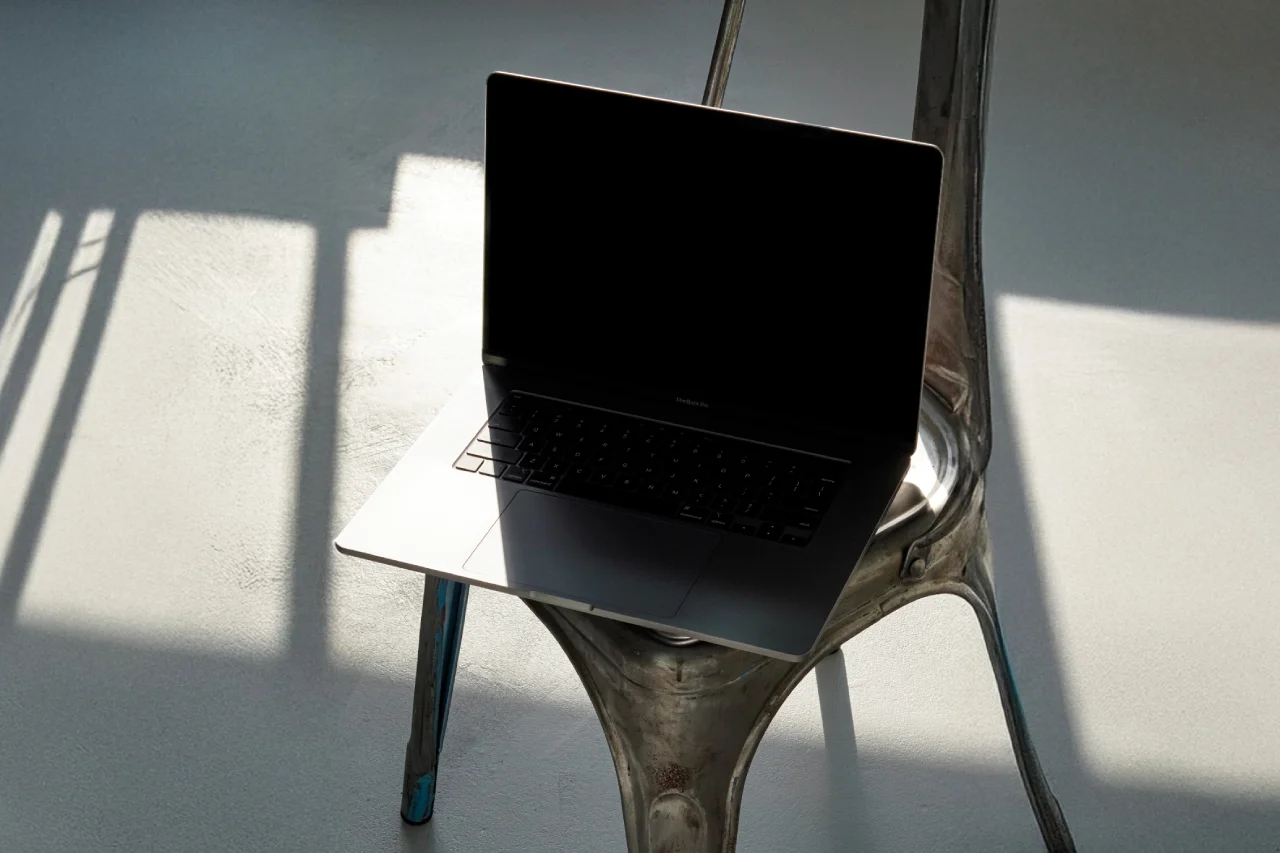 Realistic Laptop Mockup on a Metal Chair