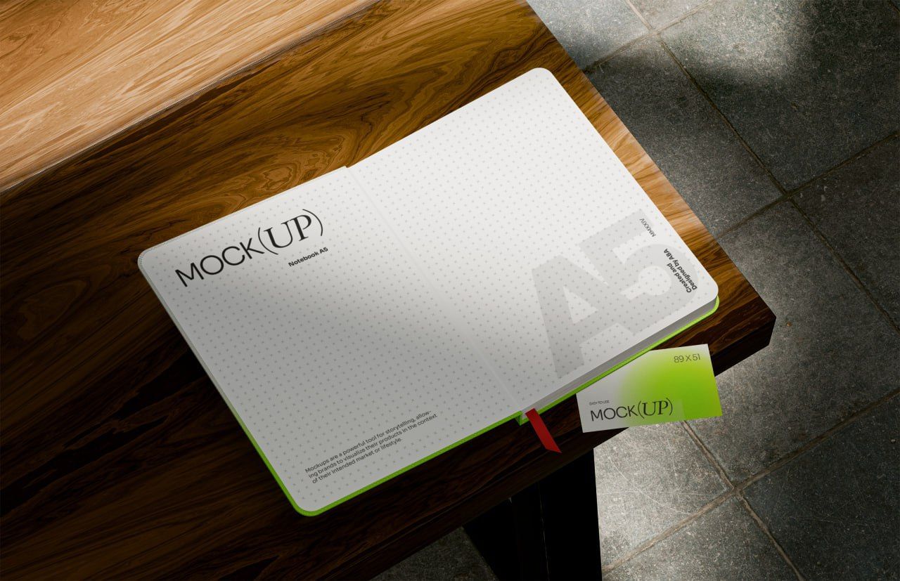 Open Notebook Mockup on Wooden Table
